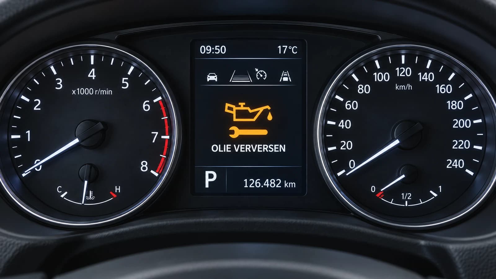 Dashboardmelding "Olie verversen" op het instrumentenpaneel